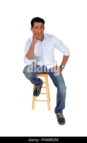 Full length image of Asian man sitting Stock Photo