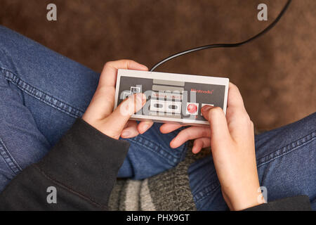 Nintengo NES,playing Super Mario 3 Stock Photo