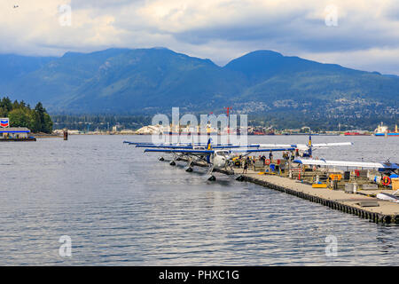 Vancouver, Canada - August 04, 2018:  De Havilland Beaver sea planes docked at Vancouver's Harbour Airport in Coal Harbour district Stock Photo