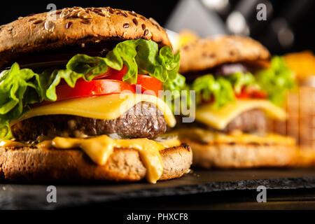 Delicious grilled burgers Stock Photo