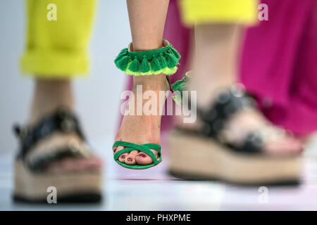 03.09.2018, North Rhine-Westphalia, Düsseldorf: Models present shoes from the summer 2019 collections. The shoe fair Gallery Shoes until September 4 shows the shoe trends of the next year. Photo: Federico Gambarini/dpa Stock Photo