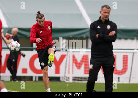 Hensol, UK. 3rd September 2018. Gareth Bale of Wales  and Wales manager Ryan Giggs during the Wales football squad training at the Vale Resort in Hensol, near Cardiff , South Wales on Monday 3rd September 2018.  the team are preparing for their  international match against the Republic of Ireland this Thursday.   pic by Andrew Orchard/Alamy Live News Stock Photo