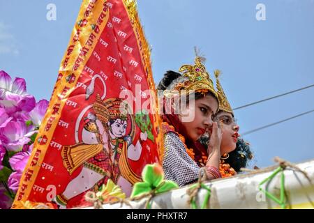 Srinagar, Kashmir. September 3, 2018 - Srinagar, J&K, - A boy and girl dressed like Lord Sri Krishna and Radha poses for a picture during a religious festival Janmashtami, marking the birth anniversary of Lord Sri Krishna. Lord Krishna, the eighth of the ten incarnations of Hindu God Lord Vishnu, who is considered the Preserver of the Universe, is one of Hinduism's most popular gods. Credit: Saqib Majeed/SOPA Images/ZUMA Wire/Alamy Live News Stock Photo