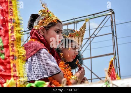 Srinagar, Kashmir. September 3, 2018 - Srinagar, J&K, - A boy and girl dressed like Lord Sri Krishna and Radha take part in the celebration of the religious festival Janmashtami, marking the birth anniversary of Lord Sri Krishna. Lord Krishna, the eighth of the ten incarnations of Hindu God Lord Vishnu, who is considered the Preserver of the Universe, is one of Hinduism's most popular gods. Credit: Saqib Majeed/SOPA Images/ZUMA Wire/Alamy Live News Stock Photo