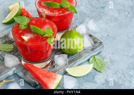 Ice watermelon mojito and slices of lime. Stock Photo