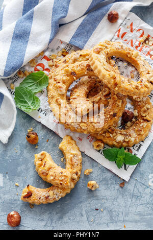 Homemade cookies sprinkled with sugar and hazelnut. Stock Photo