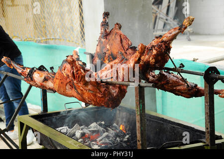 The raw lamb meat has been mixed with various spices and grilled using traditional methods. Charcoal is used to raise the aroma of spices used. Stock Photo