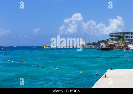 Cozumel, Mexico - May 04, 2018: The coastline and port with blue caribbean water at Cozumel, Mexico Stock Photo