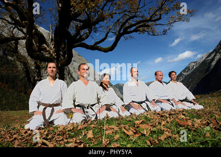 Members of Munich Karate Club USC show their sport at the big maple ground in the Karwendel Alps, Austria Stock Photo