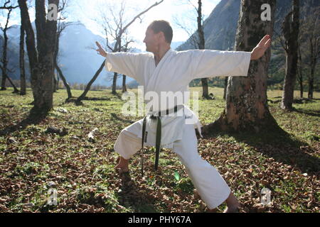 Members of Munich Karate Club USC show their sport at the big maple ground in the Karwendel Alps, Austria Stock Photo