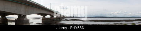 View of the Prince of Wales Bridge at low tide from Severn Beach on the English side. Stock Photo