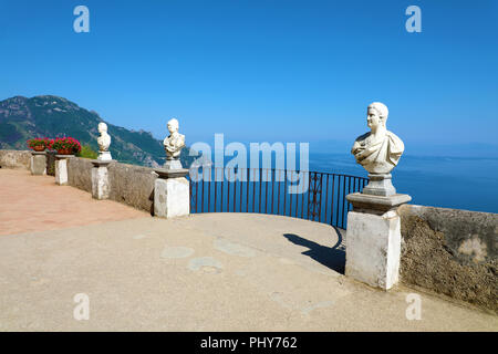 Stone statues on sunny Terrace of Infinity in Villa Cimbrone above the sea in Ravello, Amalfi Coast, Italy Stock Photo