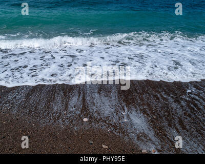 The black sand beach at Wadi Qandil. Mediterranean Sea, Syria. Stock Photo