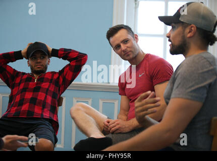 (left to right) Aston Merrygold, Harry Judd and Louis Smith during an interview with the Press Association about their forthcoming Rip It Up tour, at Dance Attic in west London. Stock Photo