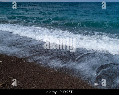 The black sand beach at Wadi Qandil. Mediterranean Sea, Syria. Stock Photo