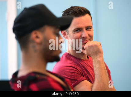 (left to right) Aston Merrygold (left) and Harry Judd during an interview with the Press Association about their forthcoming Rip It Up tour, at Dance Attic in west London. Stock Photo