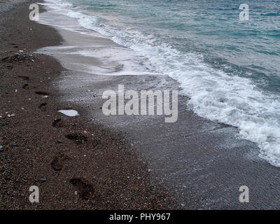 The black sand beach at Wadi Qandil. Mediterranean Sea, Syria. Stock Photo