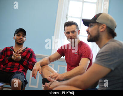 (left to right) Aston Merrygold, Harry Judd and Louis Smith during an interview with the Press Association about their forthcoming Rip It Up tour, at Dance Attic in west London. Stock Photo