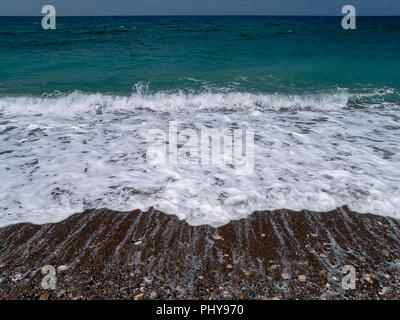 The black sand beach at Wadi Qandil. Mediterranean Sea, Syria. Stock Photo