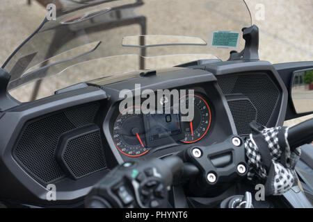 The electronic control panel on a Can-Am’s Spyder F3 Limited, a Delta trikes motorcycle with two front wheels and one drive wheel on the back Stock Photo