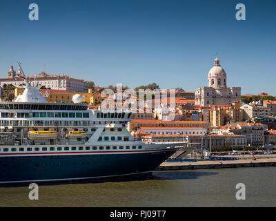 Portugal, Lisbon, Fred Olsen Line MV Balmoral at cruise terminal looking towards Campo de Sta Clara and Panteo Nacional dome Stock Photo