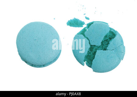 broken blue macarons isolated on white background closeup Stock Photo