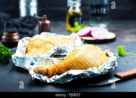 chicken legs with spice, chicken kegs in foil Stock Photo