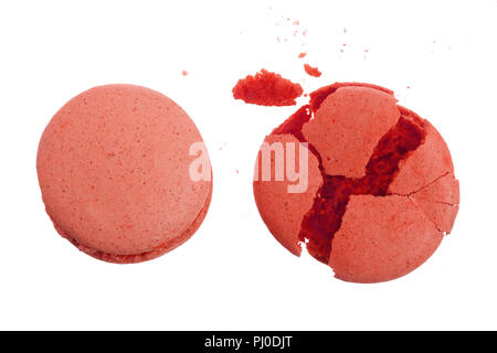broken red macarons isolated on white background closeup Stock Photo