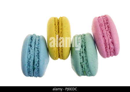 colored macaroons isolated on white background without a shadow closeup. Top view. Flat lay Stock Photo