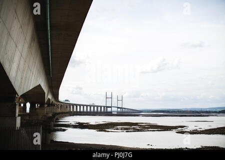 The Prince of Wales Bridge (Second Severn Crossing near the Severn Bridge) looking over the estuary from Severn Beach on the English side near Bristol Stock Photo