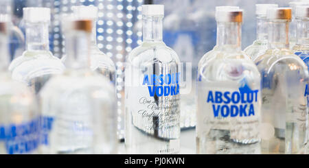 Bottles of Absolut Vodka on a shelf of a duty free shop in Istanbul Ataturk Airport, Istanbul, Turkey. Stock Photo