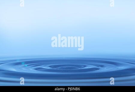 blue rings on a water surface Stock Photo