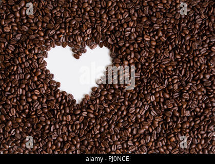 love of coffee, symbol of love, shape of heart from coffee beans Stock Photo