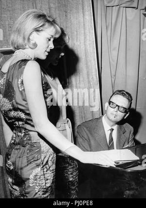 Kessler Twins ALICE KESSLER and ELLEN KESSLER young play on a see saw