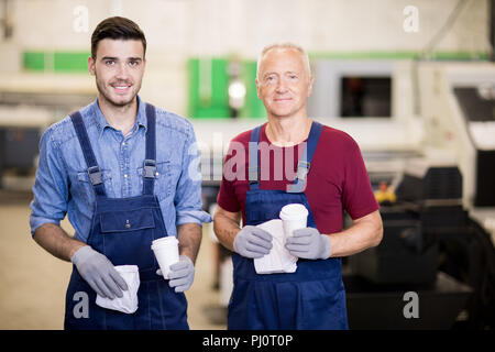 Engineers in workshop Stock Photo