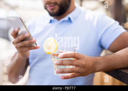 Contemporary Man Using Smartphone Stock Photo