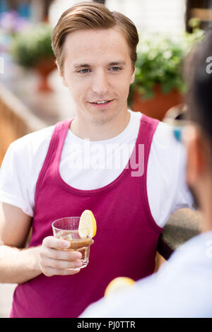 Modern Young Man in Bar Stock Photo