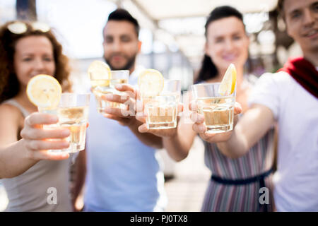 Friends Enjoying Drinks at Party Stock Photo