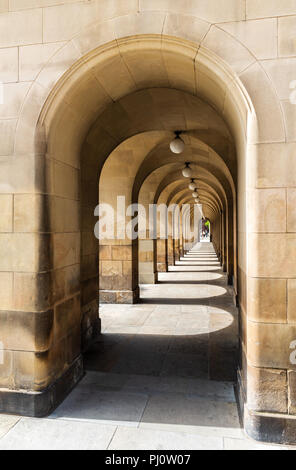 Looking through the arches of Manchester Central Library in St Peter's Square Stock Photo