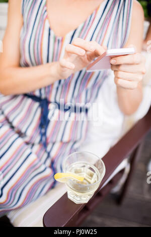 Young Woman Using Smartphone Stock Photo