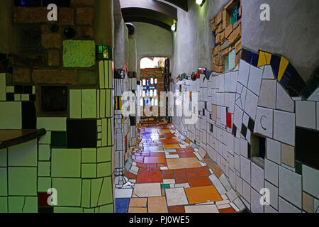 The Hundertwasser Toilets, a public toilet located at 60 Gillies Street, the main street of the town of Kawakawa in northern New Zealand Stock Photo