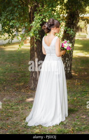 beautiful bride in wedding white dress Stock Photo
