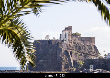 Ruins of medieval Castello Normanno in Aci Castello, Catania, Sicily, Italy Stock Photo