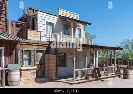 Old western town with adobe and wooden buildings under a blue sky Stock ...