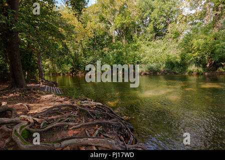 The Shenandoah River bends around a curve by a canoe launch. Stock Photo