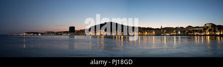 Panoramic view on the old town and Marjan park in Split, Croatia at evening. Stock Photo