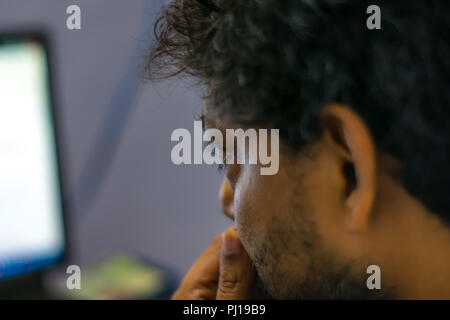 Businessman Thinking Ideas Strategy Working Concept. Young businessman working at late night. Stock Photo