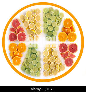 Many fruits in the shape of a sliced citrus including oranges, grapefruits, lemons and limes Stock Photo