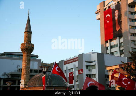 Izmir, Turkey - June 15, 2018: June 15 Day of Democracy in Turkey Izmir. People holding Turkish flags at Konak square in Izmir and in front of the his Stock Photo