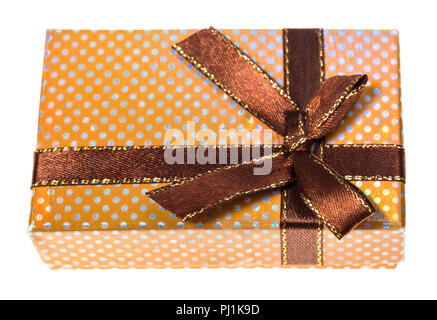 shiny yellow gift box tied by brown ribbon with bow cutout on white background Stock Photo
